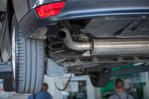 Rear view of vehicle's tailpipe and exhaust system
