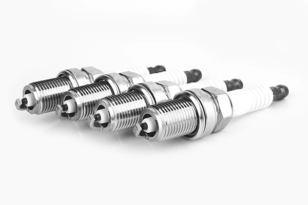 Spark plugs on isolated background