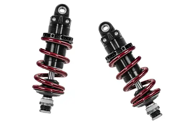 Automotive shocks on a white background.